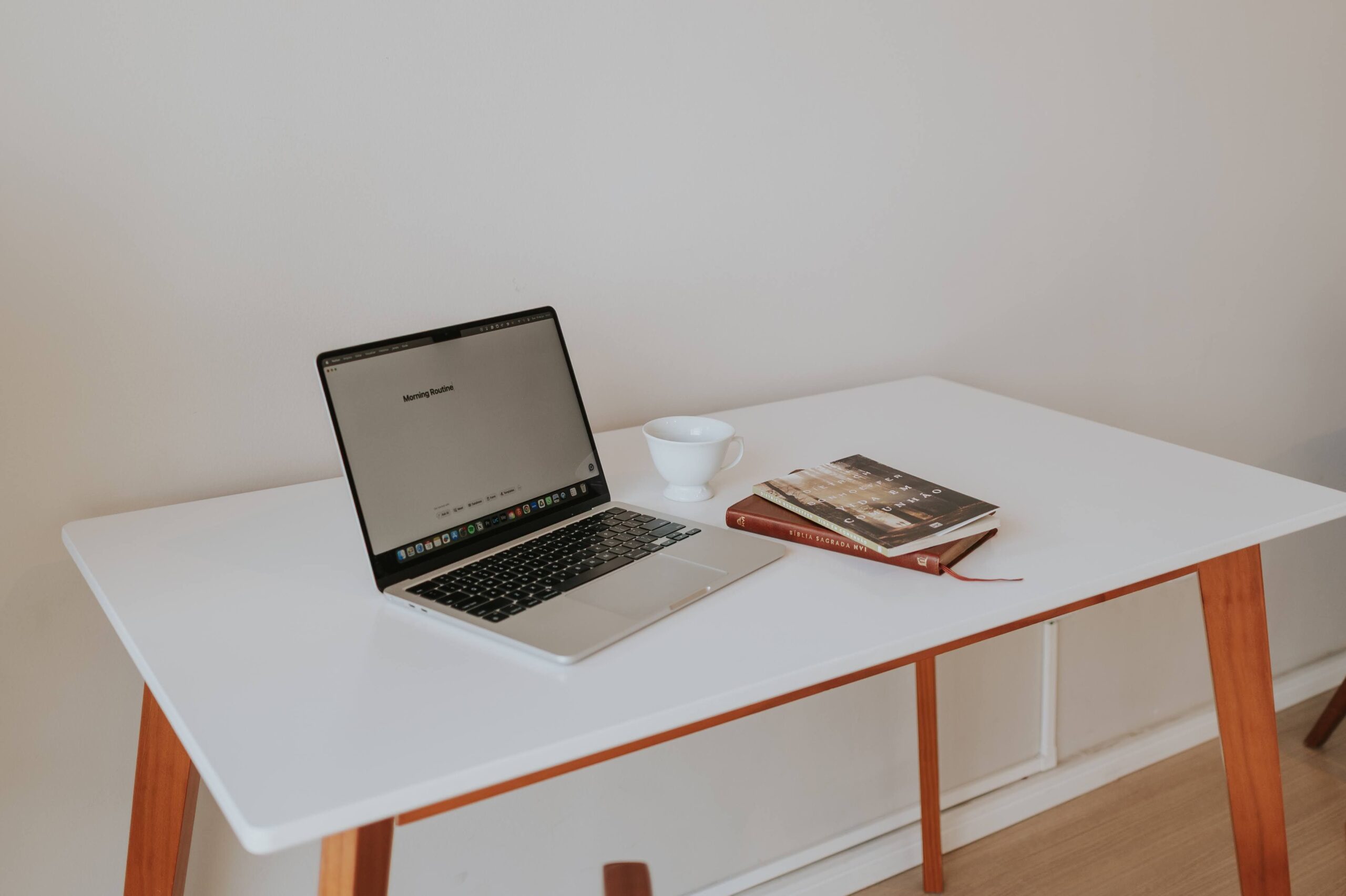 laptop on white table
